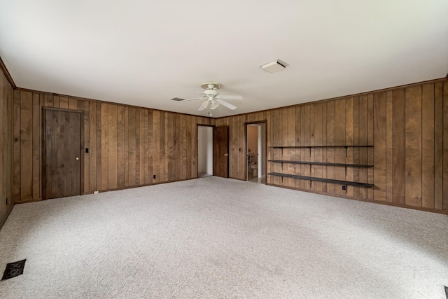 2208 Bowman Rd, Franklin, TN 37064 - carpeted spare room with wooden walls and a ceiling fan