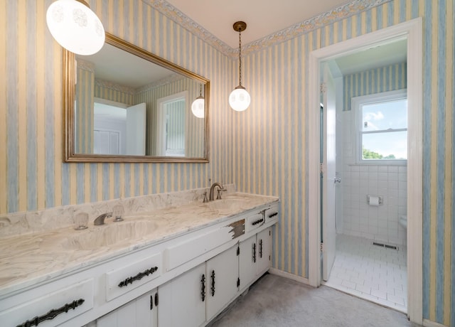2208 Bowman Rd, Franklin, TN 37064 - bathroom featuring double vanity and wallpapered walls