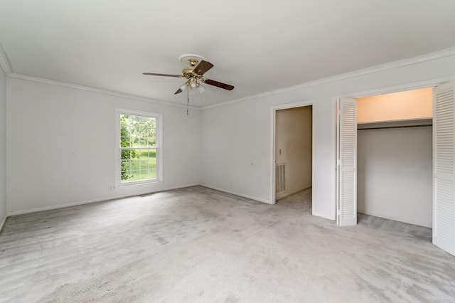 2208 Bowman Rd, Franklin, TN 37064 - unfurnished bedroom with crown molding, carpet floors, a closet, and ceiling fan