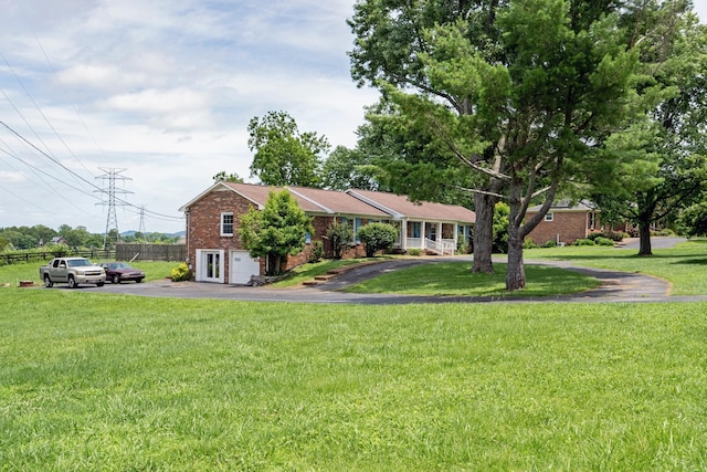 2208 Bowman Rd, Franklin, TN 37064 - ranch-style home with brick siding and asphalt driveway