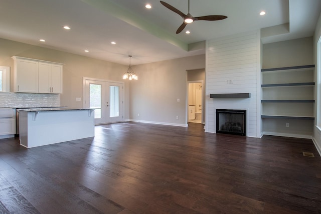 264 Dink Rut Rd, Portland, TN 37148 - unfurnished living room featuring a ceiling fan, dark wood finished floors, recessed lighting, a chandelier, and a fireplace