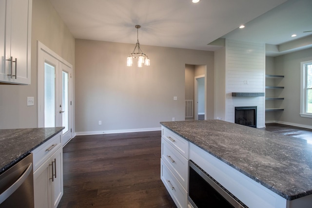 264 Dink Rut Rd, Portland, TN 37148 - kitchen with stainless steel dishwasher, white cabinets, a fireplace, and recessed lighting