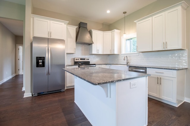 264 Dink Rut Rd, Portland, TN 37148 - kitchen featuring appliances with stainless steel finishes, custom exhaust hood, white cabinets, a center island, and recessed lighting