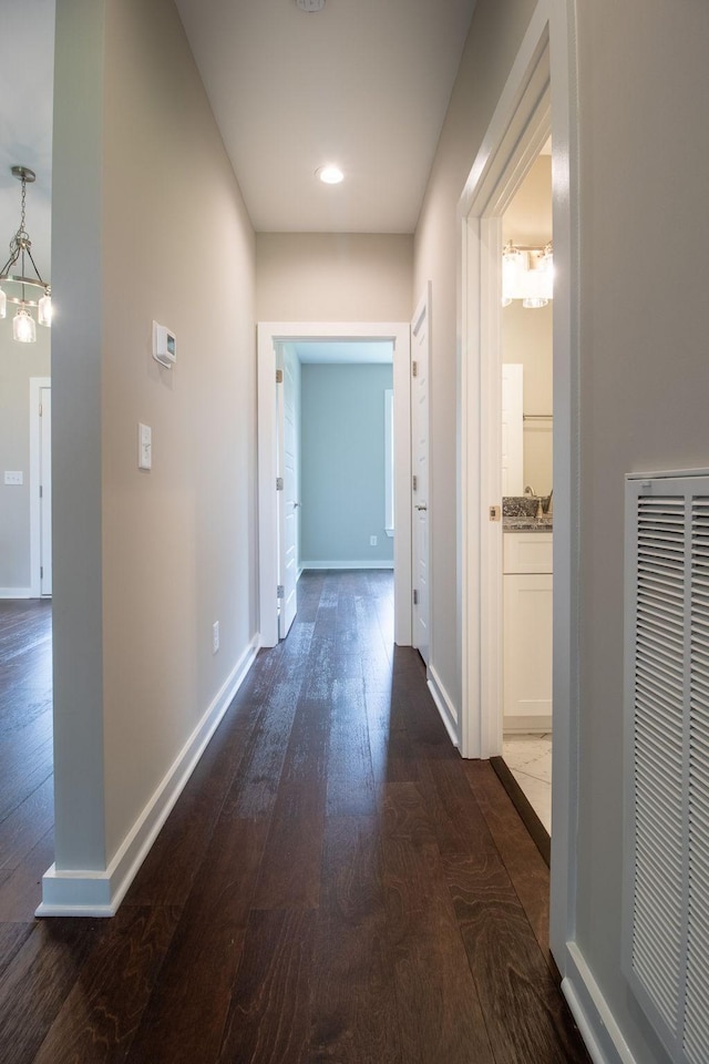 264 Dink Rut Rd, Portland, TN 37148 - hallway with dark wood-style floors, a chandelier, and recessed lighting