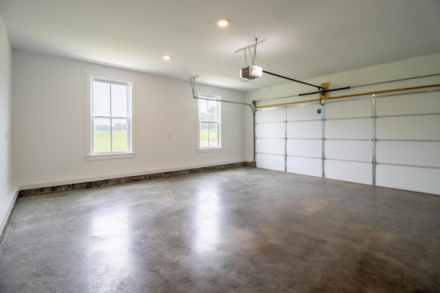 264 Dink Rut Rd, Portland, TN 37148 - garage featuring a garage door opener and recessed lighting