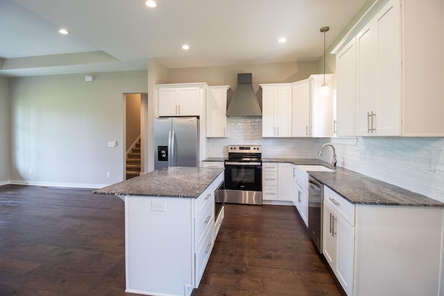 264 Dink Rut Rd, Portland, TN 37148 - kitchen with appliances with stainless steel finishes, custom range hood, white cabinets, backsplash, and recessed lighting
