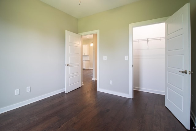 264 Dink Rut Rd, Portland, TN 37148 - unfurnished bedroom with dark wood finished floors and a closet