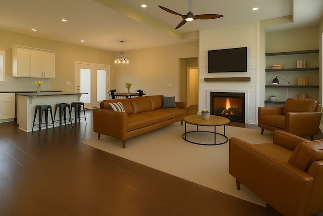 264 Dink Rut Rd, Portland, TN 37148 - living room with recessed lighting, a fireplace, dark wood-type flooring, a ceiling fan, and built in shelves