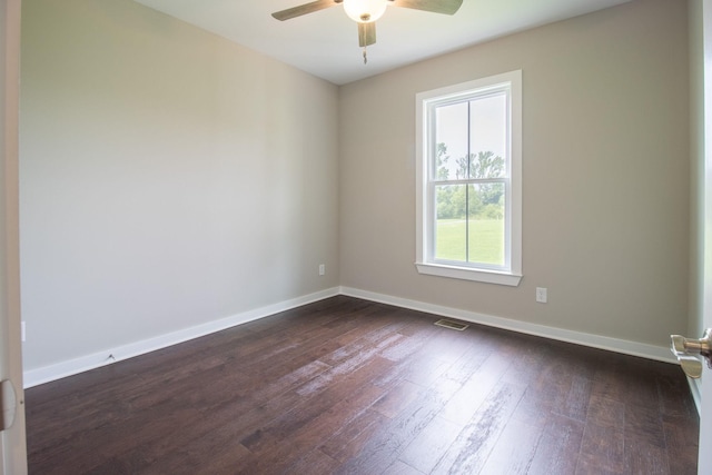 264 Dink Rut Rd, Portland, TN 37148 - spare room featuring ceiling fan and dark wood-style flooring