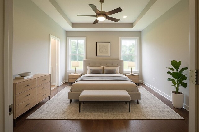 264 Dink Rut Rd, Portland, TN 37148 - bedroom featuring a tray ceiling, multiple windows, and dark wood-style floors