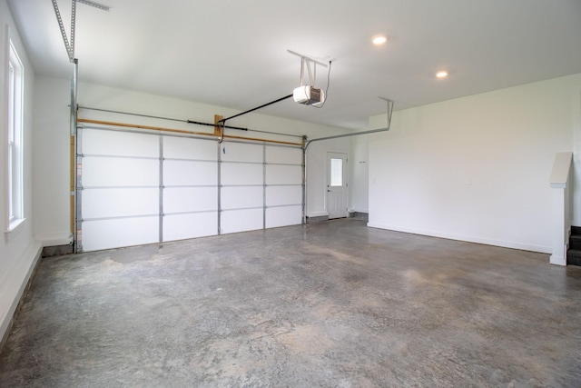 264 Dink Rut Rd, Portland, TN 37148 - garage featuring a garage door opener and recessed lighting
