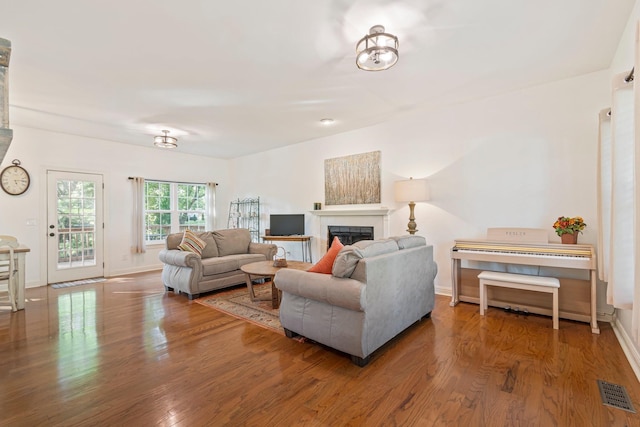 824 W Benjamin Ct, Franklin, TN 37067 - living room with a fireplace and wood finished floors