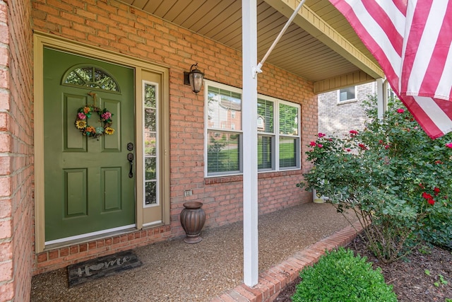 824 W Benjamin Ct, Franklin, TN 37067 - doorway to property with brick siding and covered porch