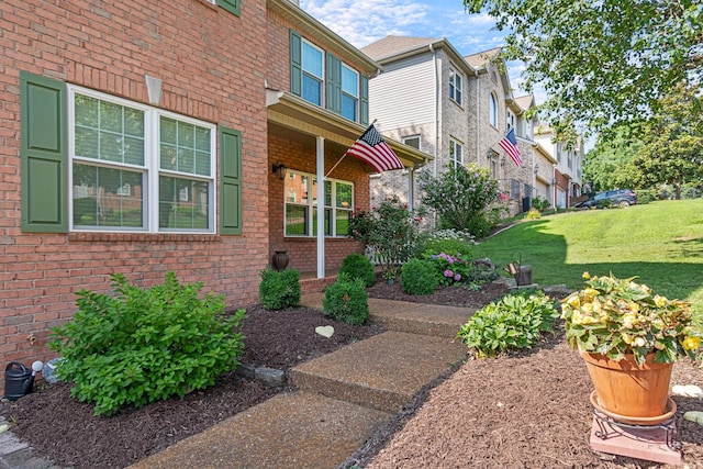 824 W Benjamin Ct, Franklin, TN 37067 - entrance to property with a yard, a residential view, and brick siding