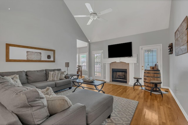 919 Compton Rd, Murfreesboro, TN 37130 - living room featuring high vaulted ceiling, light wood-style floors, a fireplace with flush hearth, and a ceiling fan