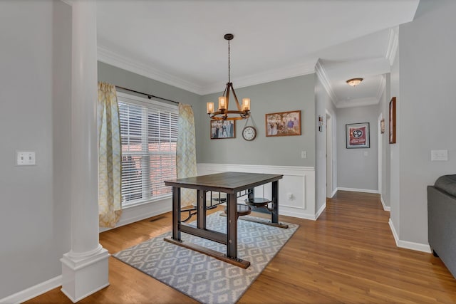 919 Compton Rd, Murfreesboro, TN 37130 - dining space featuring a chandelier, wood finished floors, and crown molding
