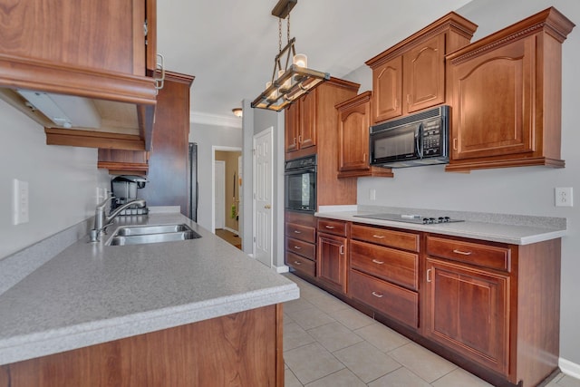 919 Compton Rd, Murfreesboro, TN 37130 - kitchen featuring black appliances, light countertops, light tile patterned floors, brown cabinets, and hanging light fixtures