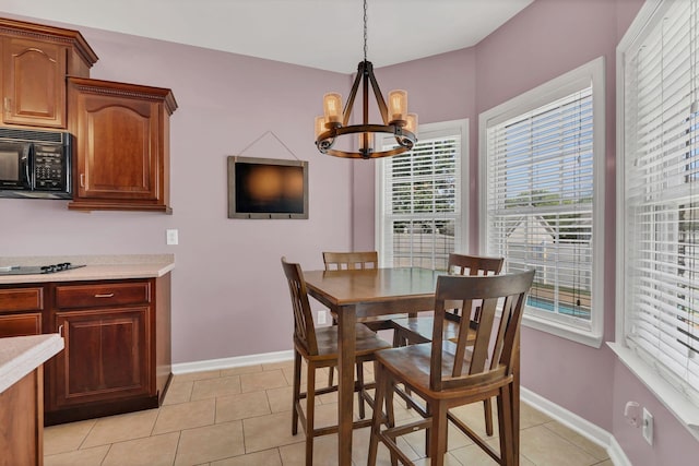919 Compton Rd, Murfreesboro, TN 37130 - dining area with a chandelier and light tile patterned floors