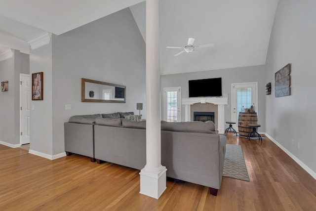 919 Compton Rd, Murfreesboro, TN 37130 - living room with a ceiling fan, light wood-style floors, high vaulted ceiling, and a tiled fireplace