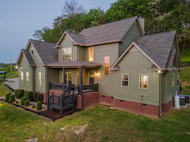 3092 Morel Rd, Columbia, TN 38401 - back of house featuring board and batten siding, roof with shingles, crawl space, a porch, and a lawn