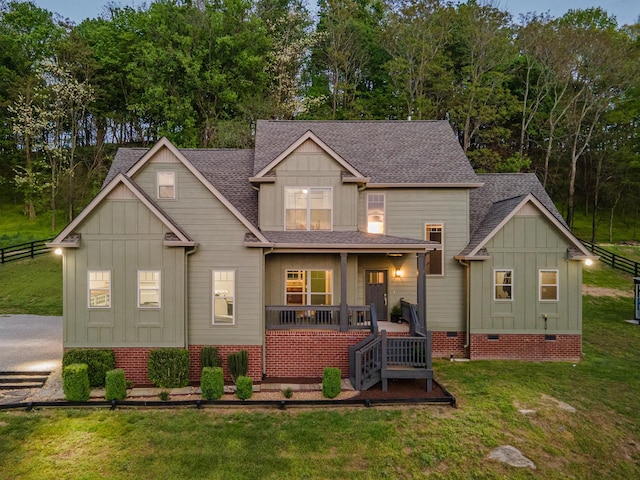 3092 Morel Rd, Columbia, TN 38401 - rear view of property with board and batten siding, covered porch, roof with shingles, and crawl space