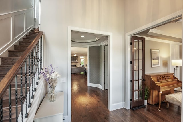 1328 Reynard Dr, Gallatin, TN 37066 - entryway with crown molding, dark wood finished floors, a raised ceiling, and stairs