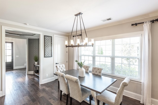 1328 Reynard Dr, Gallatin, TN 37066 - dining area with plenty of natural light, a chandelier, crown molding, and dark wood-type flooring