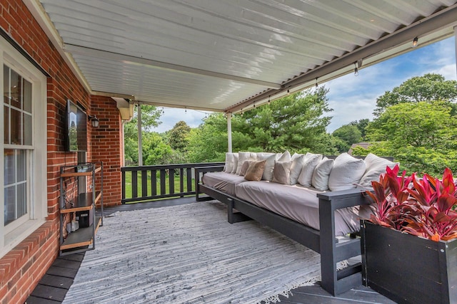 2779 Landcashire Ct, Thompsons Station, TN 37179 - deck featuring an outdoor hangout area and view of wooded area
