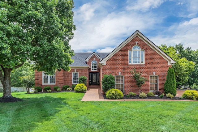 2779 Landcashire Ct, Thompsons Station, TN 37179 - traditional-style home featuring brick siding