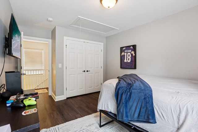 305 White Moss Pl, Franklin, TN 37064 - bedroom featuring attic access, wood finished floors, and a closet