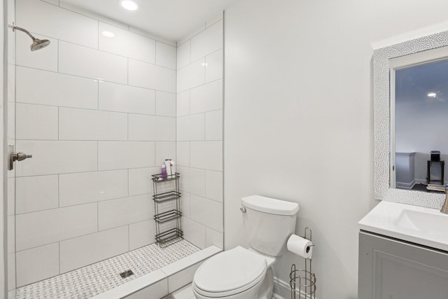 305 White Moss Pl, Franklin, TN 37064 - bathroom featuring vanity, tiled shower, and recessed lighting