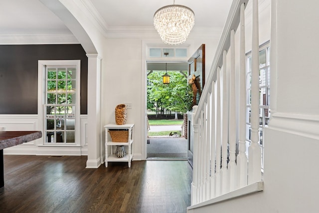 305 White Moss Pl, Franklin, TN 37064 - entryway with wood finished floors, arched walkways, a chandelier, crown molding, and stairs