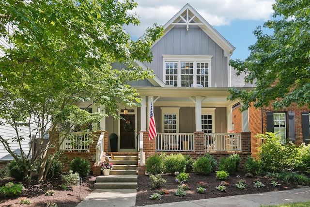 305 White Moss Pl, Franklin, TN 37064 - craftsman-style house featuring covered porch, board and batten siding, and brick siding