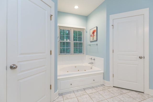 238 Wiggins Creek Dr, Sewanee, TN 37375 - bathroom with a jetted tub and tile patterned flooring