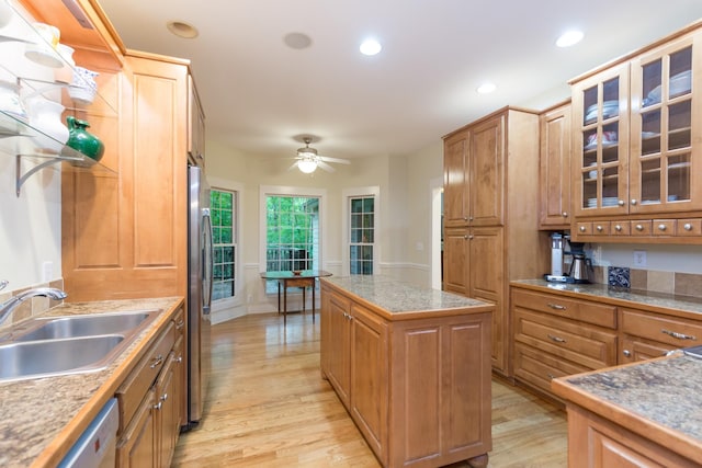 238 Wiggins Creek Dr, Sewanee, TN 37375 - kitchen with light wood-style floors, a center island, ceiling fan, dishwashing machine, and freestanding refrigerator