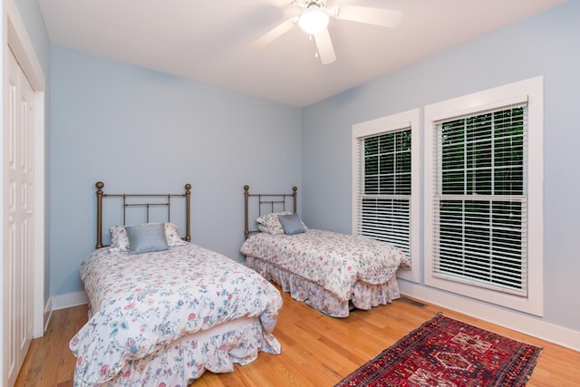 238 Wiggins Creek Dr, Sewanee, TN 37375 - bedroom with wood finished floors, a closet, and ceiling fan