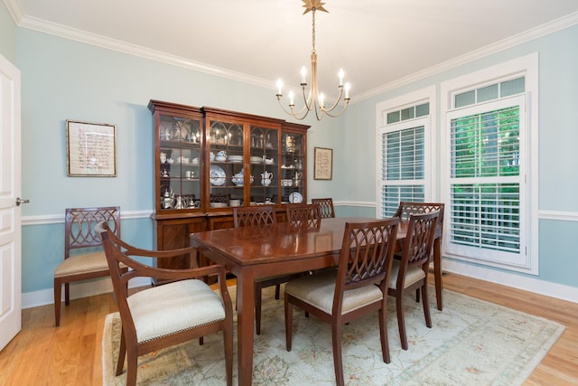 238 Wiggins Creek Dr, Sewanee, TN 37375 - dining space featuring a chandelier, light wood-style flooring, and crown molding