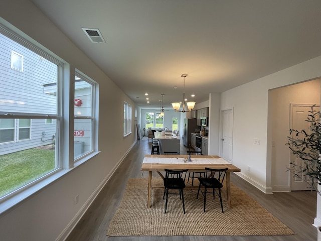 1169 Short St, Spring Hill, TN 37174 - dining space with dark wood finished floors, a chandelier, and recessed lighting