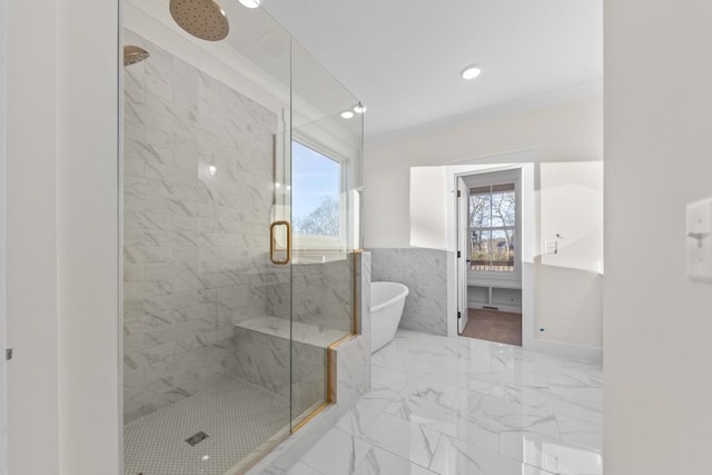 17 Peyton Pl, Columbia, TN 38401 - bathroom with a marble finish shower, a freestanding tub, marble finish flooring, tile walls, and a wainscoted wall