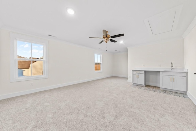 17 Peyton Pl, Columbia, TN 38401 - unfurnished living room with attic access, light carpet, recessed lighting, a ceiling fan, and ornamental molding