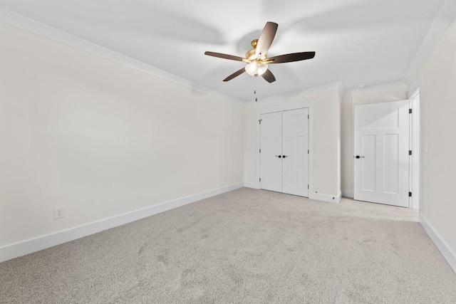 17 Peyton Pl, Columbia, TN 38401 - unfurnished bedroom featuring light colored carpet, crown molding, a ceiling fan, and a closet