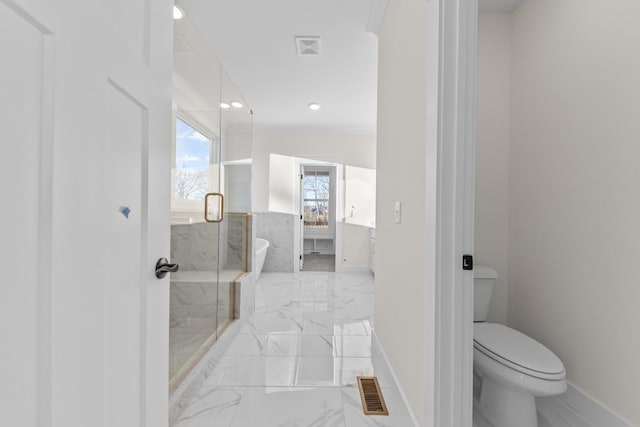 17 Peyton Pl, Columbia, TN 38401 - full bath featuring marble tiled flooring, a soaking tub, a stall shower, and recessed lighting