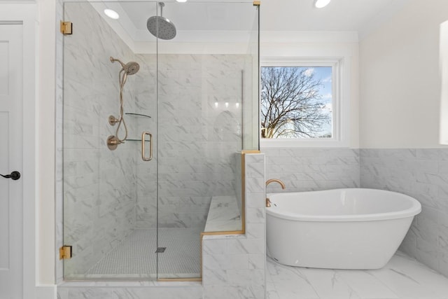 17 Peyton Pl, Columbia, TN 38401 - full bath featuring marble finish floors, a freestanding tub, a stall shower, tile walls, and recessed lighting