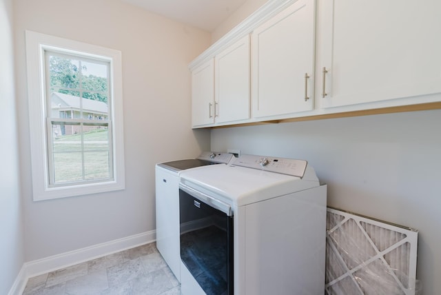 1210 Black Rd, Cunningham, TN 37052 - washroom featuring separate washer and dryer and cabinet space