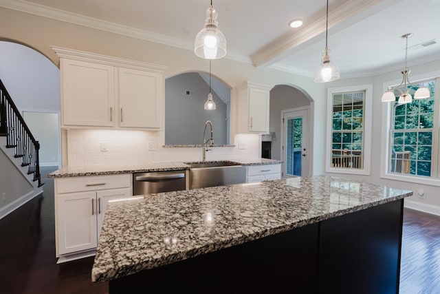 1210 Black Rd, Cunningham, TN 37052 - kitchen featuring dishwasher, arched walkways, light stone counters, tasteful backsplash, and crown molding