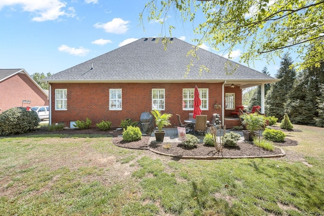939 Central Valley Rd, Murfreesboro, TN 37129 - rear view of house featuring a yard, ceiling fan, a patio, roof with shingles, and brick siding
