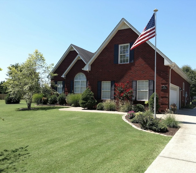 939 Central Valley Rd, Murfreesboro, TN 37129 - view of front of property with brick siding, a front yard, and a garage