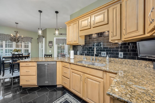 939 Central Valley Rd, Murfreesboro, TN 37129 - kitchen with stainless steel dishwasher, light brown cabinets, a peninsula, a chandelier, and granite floors