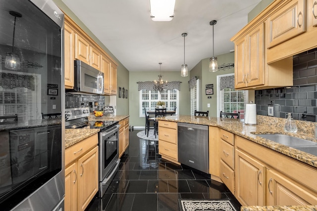 939 Central Valley Rd, Murfreesboro, TN 37129 - kitchen featuring stainless steel appliances, a chandelier, light brown cabinets, and backsplash