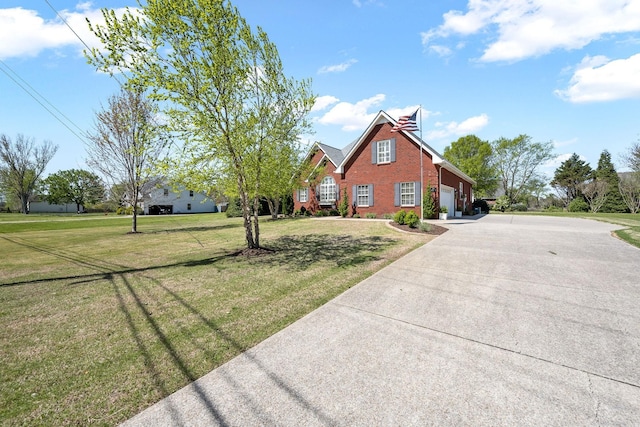 939 Central Valley Rd, Murfreesboro, TN 37129 - view of front facade with brick siding, concrete driveway, a front lawn, and a garage